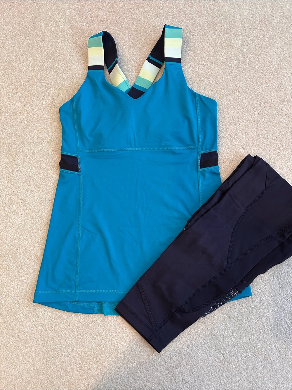 Coordinating Lululemon set - teal tank with navy leggings